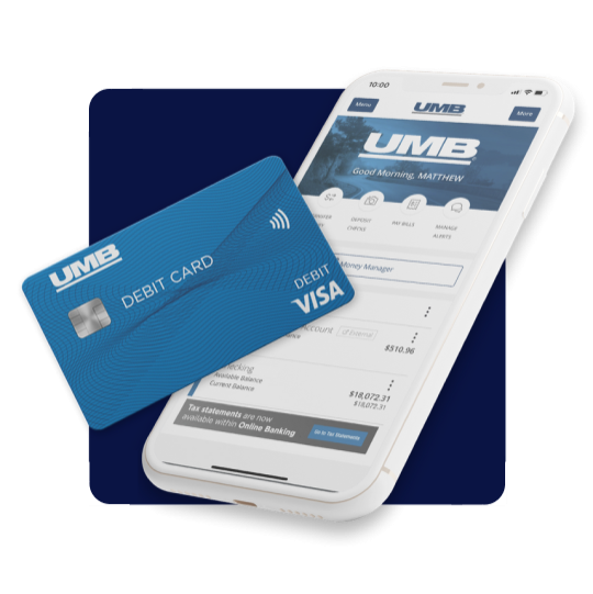 Mobile phone with online banking app open and credit card laying on phone